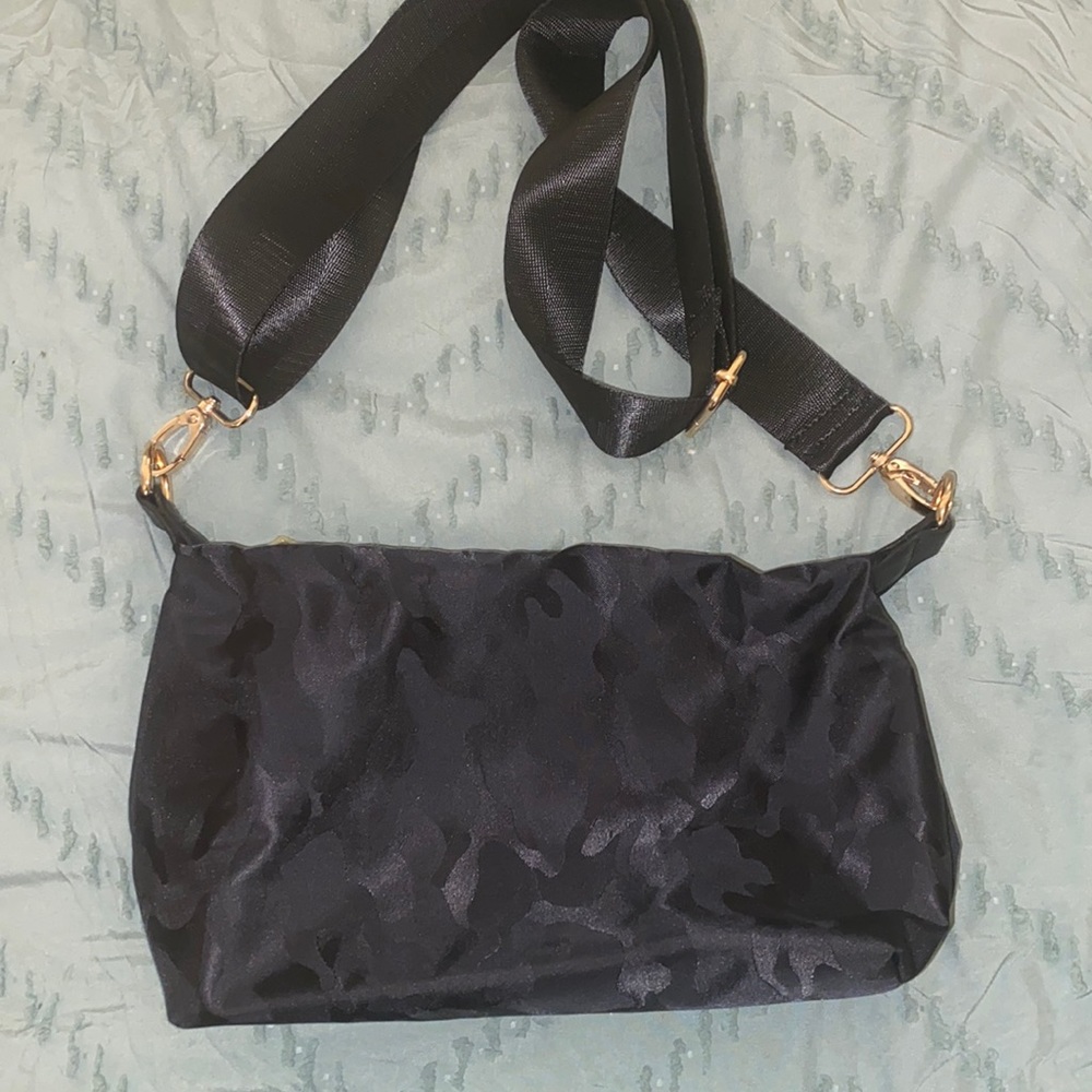 Black on black camo cross body bag with interchangeable strap
